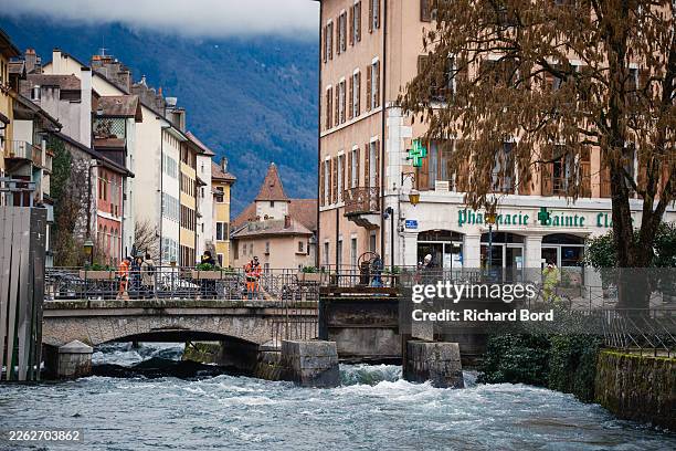 View of the old city as flow valves are fully open to regulate the Thiou river, the the shortest river in France, on February 20, 2026 in Annecy,...