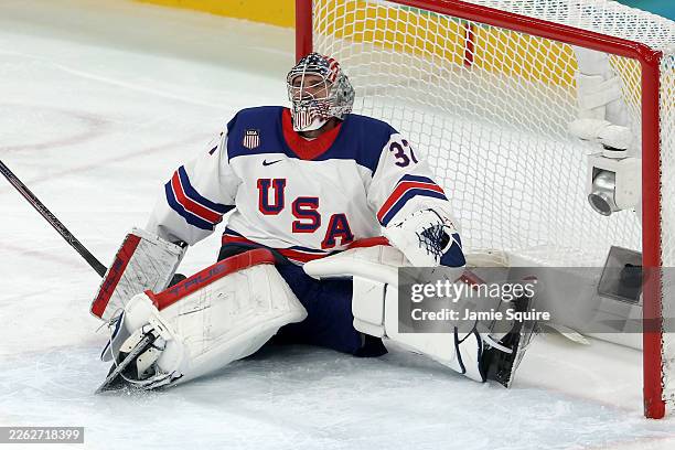 Connor Hellebuyck of Team United States reacts after giving up a goal scored by Juraj Slafkovsky of Team Slovakia in the third period during the...