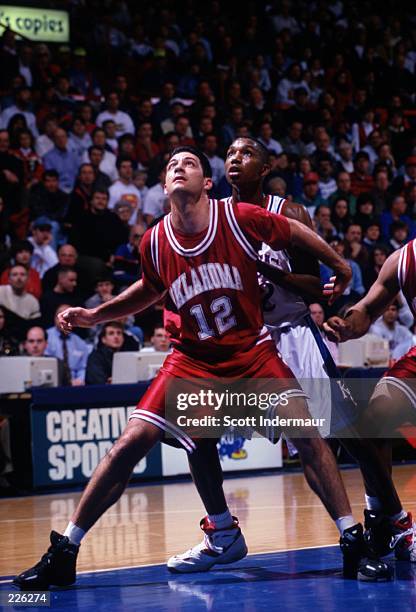 RYAN MINOR OF THE UNIVERSITY OF OKLAHOMA WAITS FOR A REBOUND DURING THE OKLAHOMA VERSUS THE UNIVERSITY OF KANSAS AT ALLEN ARENA IN LAWRENCE, KANSAS.