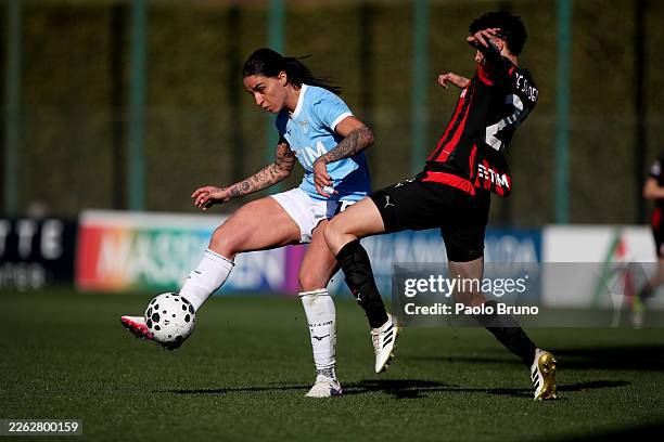 Martina Piemonte of SS Lazio women competes for the ball with Emma Koivisto of AC Milan women during the Serie A women match between SS Lazio women...