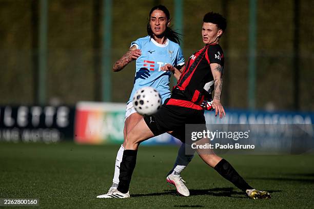 Martina Piemonte of SS Lazio women competes for the ball with Emma Koivisto of AC Milan women during the Serie A women match between SS Lazio women...