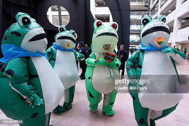 Portland Frog Brigade members gather in the Hart Senate Office Building on Tuesday, February 24 to deliver copies of the U.S. Constitution to members...