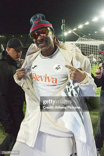 Swansea City AFC club co-owner Snoop Dogg walks around the pitch prior to the Sky Bet Championship match between Swansea City and Preston North End...