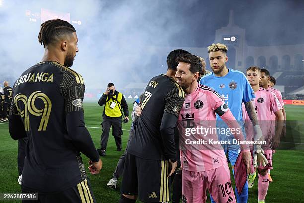 Lionel Messi of Inter Miami CF hugs Son Heung-Min of Los Angeles FC prior to the MLS match between Los Angeles Football Club and Inter Miami CF at...