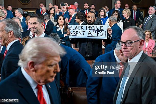 Rep. Al Green protests as President Donald Trump arrives to deliver the State of the Union address during a joint session of Congress at the Capitol...