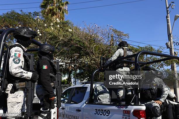 Elements of the National Guard take security measures and patrol the vicinity of the Jalisco Institute of Forensic Sciences where the bodies of the...