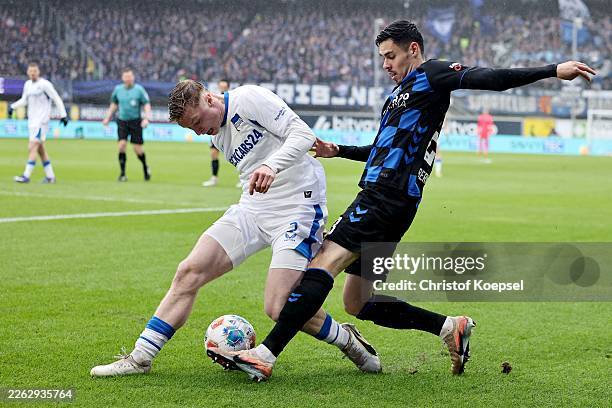 Julian Eitschberger of Hertha BSC Berlin challenges Raphael Obermair of SC Paderborn during the 2. Bundesliga match between SC Paderborn 07 and...