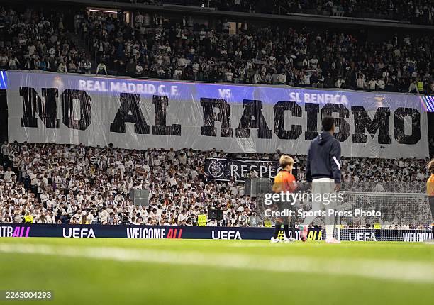 Vinícius Júnior of Real Madrid enters field of play in front of a fans banner against racism during the UEFA Champions League 2025/26 League Knockout...
