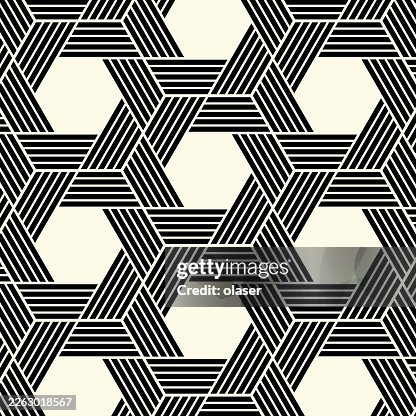 Seamless black and cream geometric pattern with interlocking star shapes formed by parallel lines creating a repetitive, structured design with high contrast and clean edges. Seamless black and cream geometric pattern with interlocking star shapes formed by parallel lines creating a repetitive, structured design with high contrast and clean edges.