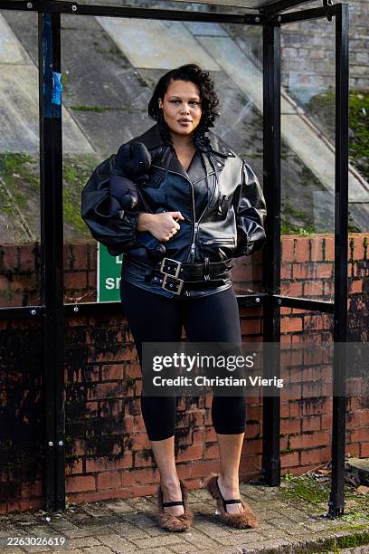 Alva Claire wears black leather jacket, capri pants outside Simone Rocha during London Fashion Week February 2026 on February 22, 2026 in London,...