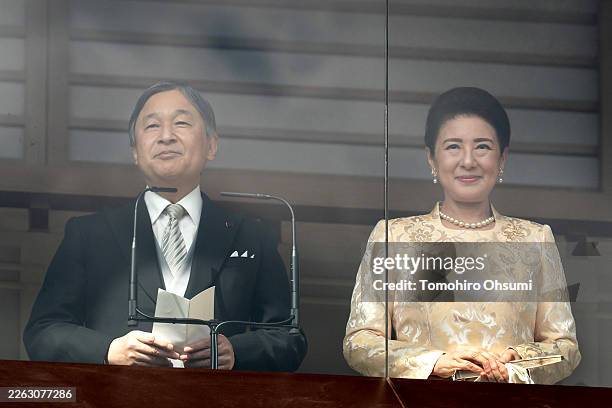 Japan's Emperor Naruhito speaks as Empress Masako listens during a public appearance marking the Emperor's birthday on February 23 in Tokyo, Japan....