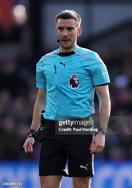 Referee Tom Kirk during the Premier League match between Crystal Palace and Wolverhampton Wanderers at Selhurst Park on February 22, 2026 in London,...