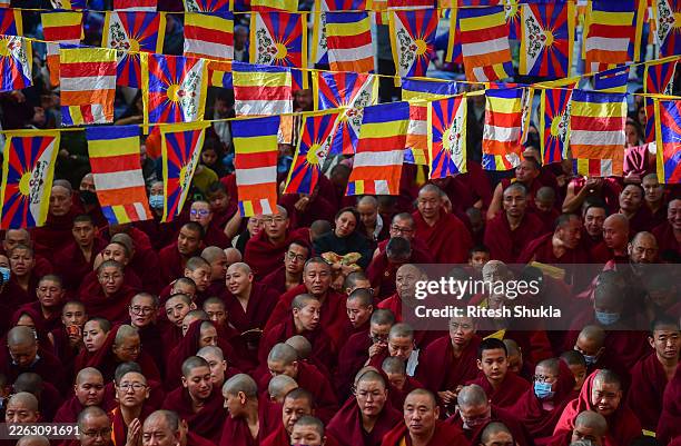 Tibetan monks and nuns-in-Exile take parts in the prayers for the wellness of The Tibetan spiritual leader, the 14th Dalai Lama during the official...
