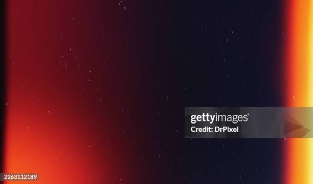 vintage red orange light leak film texture background - grainy stock pictures, royalty-free photos & images