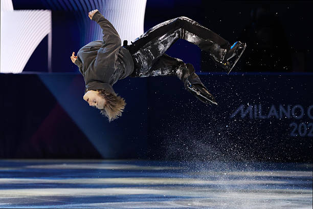 Ilia Malinin of the United States performs a backflip in the Figure Skating Exhibition Gala on day fifteen of the Milano Cortina 2026 Winter Olympic...