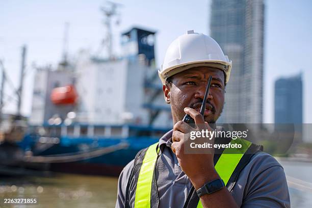 the civil engineer is working with fishing vessel. - shipbuilder stock pictures, royalty-free photos & images