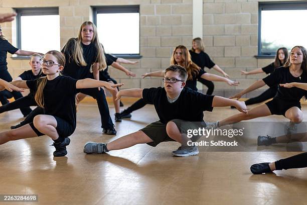 stretching session pre - dance - disabled child dancing stock pictures, royalty-free photos & images