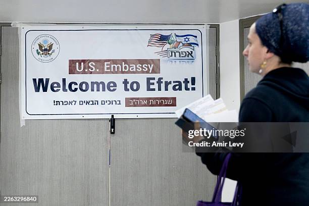 Woman arrives to receive consular services at the Jewish settlement of Efrat as the United States embassy in Israel begins providing "routine...