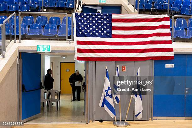 Man waits to receive consular services at the Jewish settlement of Efrat as the United States embassy in Israel begins providing "routine passport...