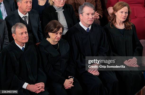Supreme Court Chief Justice John Roberts, Associate Justice Elena Kagan, Associate Justice Brett Kavanaugh and Associate Justice Amy Coney Barrett...