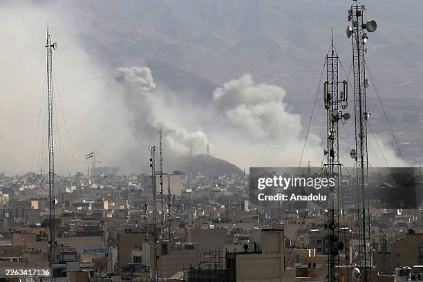 Smoke rises over the city center after an Israeli army launches 2nd wave of airstrikes on Iran on February 28, 2026.