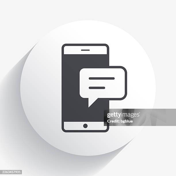 smartphone with speech bubble. icon on circle button with long shadow - iphone text message screen stock illustrations