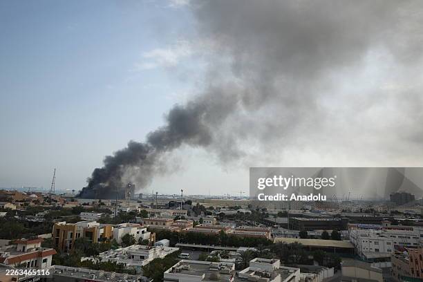 Smoke rises after Iran launched a missile attack targeting the headquarters of the U.S. Navyâs Fifth Fleet in Manama, following what it described as...