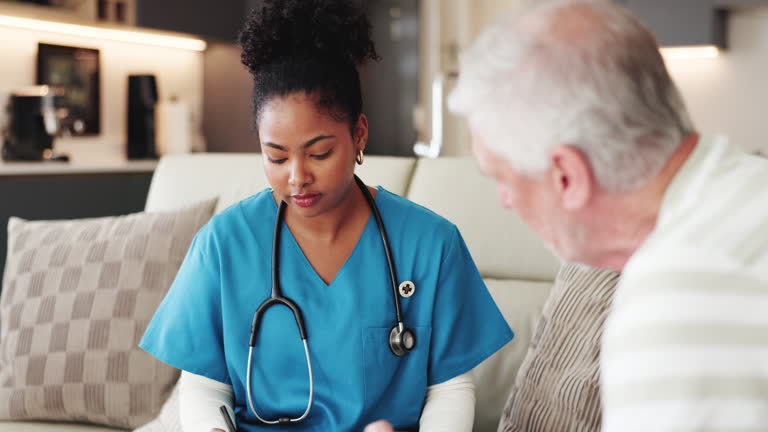 https://media.gettyimages.com/id/2263498364/video/clipboard-nurse-and-senior-man-on-couch-for-discussion-medical-evaluation-and-health-survey.jpg?b=1&s=640x640&k=20&c=LoCDG9gMD_JTAomuA23JpA-GC5nSmut2UxxwjmaCZ5A=