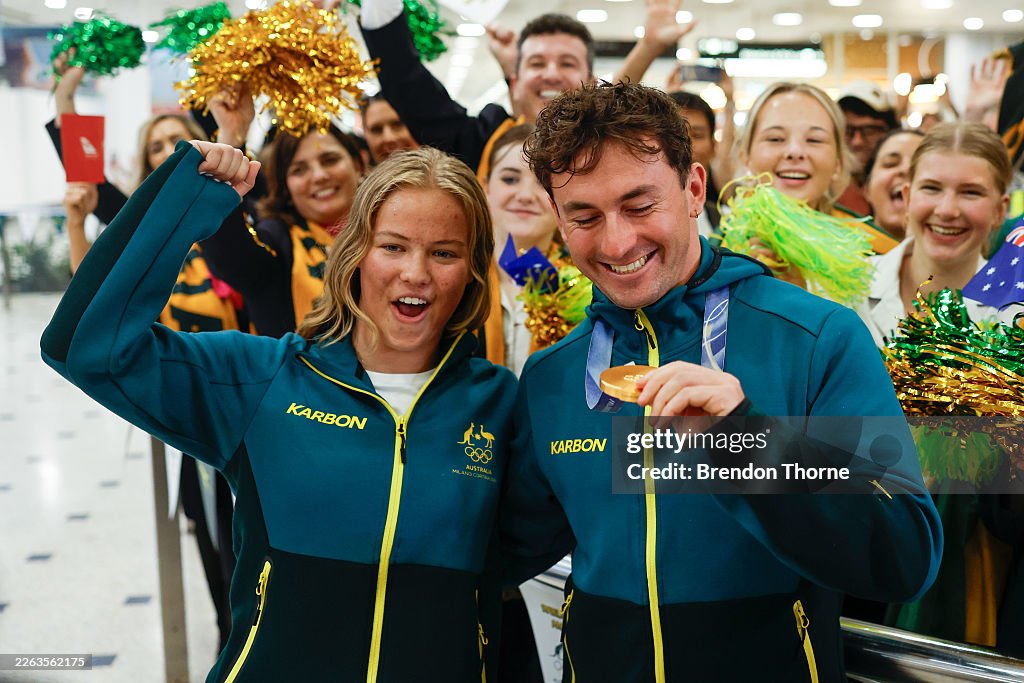 Australian Winter Olympic Medallists Cooper Woods & Danielle Scott Arrive Home