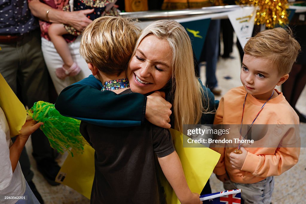 Australian Winter Olympic Medallists Cooper Woods & Danielle Scott Arrive Home