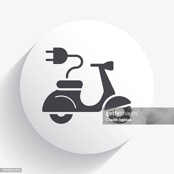 electric scooter motorcycle with plug. icon on circle button with long shadow - electrical wire white background stock illustrations
