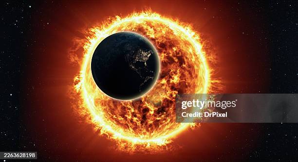 earth eclipse in front of fiery sun in deep space - solar eclipse stock-fotos und bilder