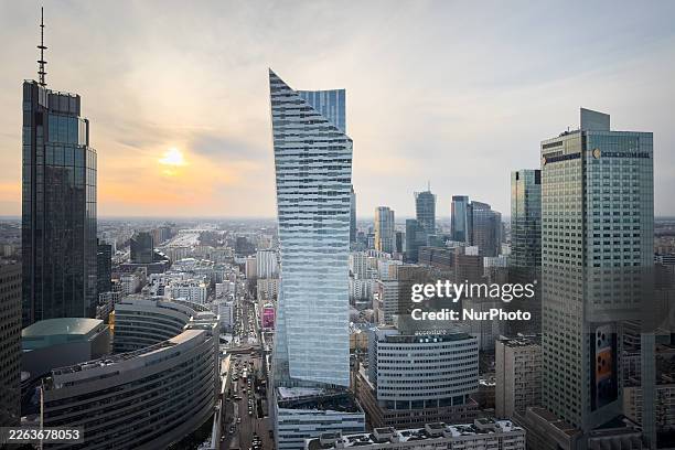 Wide view toward western Warsaw shows the modern high-rise core of the city, with Varso Tower on the left, part of Zlote Tarasy, Zlota 44, and the...