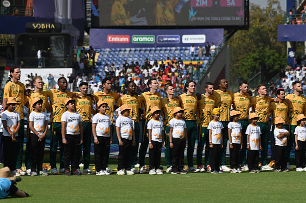 South Africa's team stands for the national anthem during the Super Eights match of the 2026 ICC Men's T20 World Cup between Zimbabwe and South...