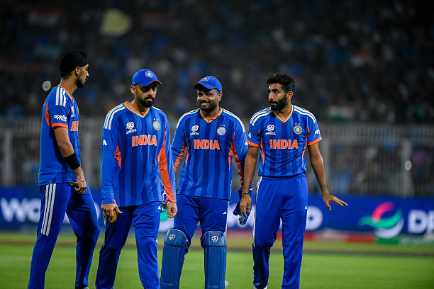 India's Jasprit Bumrah and Varun Chakravarthy and others celebrate during the ICC Men's T20 World Cup India & Sri Lanka 2026 Super 8 match between...