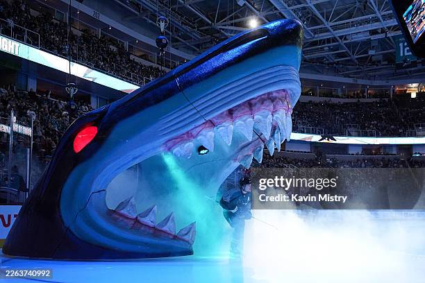 Macklin Celebrini of the San Jose Sharks takes the ice through the Shark Head before the game against the Winnipeg Jets at SAP Center on March 1,...