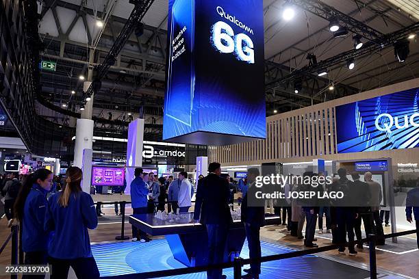 Picture taken on March 2, 2026 in Barcelona shows Qualcomm's stand adverstising 6G technology during the inauguration of the Mobile World Congress ,...