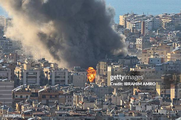 Smoke plumes billow following Israeli bombardment on Beirut's southern suburbs on March 2, 2026. The war launched by the United States and Israel...