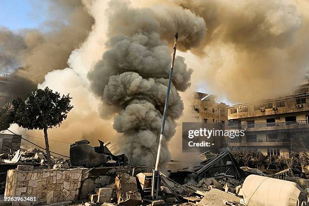 Smoke rises from the site of an Israeli airstrike on the southern suburbs of Beirut on March 3, 2026. The Israeli military issued new evacuation...
