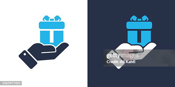 gift glyph solid icon. solid icon that can be applied anywhere, simple, pixel perfect and modern style. - exchanging gift stock illustrations
