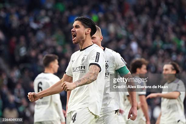 Kevin Diks of Borussia Monchengladbach celebrates scoring his team's first goal during the Bundesliga match between Borussia Mönchengladbach and 1....