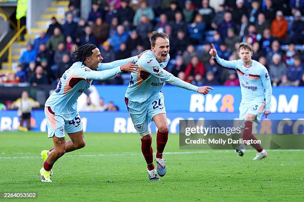 Mikkel Damsgaard of Brentford celebrates scoring his team's fourth goal during the Premier League match between Burnley and Brentford at Turf Moor on...