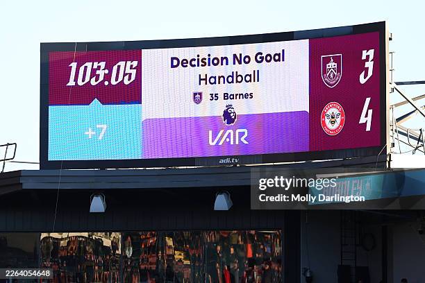 The screen in the stadium shows the goal of Ashley Barnes of Burnley ruled out for handball by the Video Assistant Referee during the Premier League...
