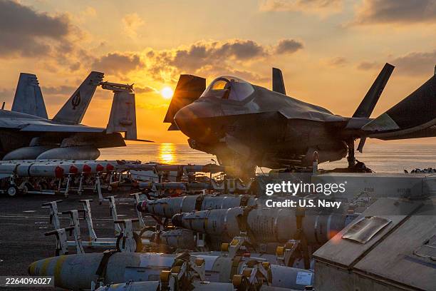 In this handout released by the U.S. Navy, an F-35C Lightning II, attached to Marine Fighter Attack Squadron 314, is staged for flight operations on...