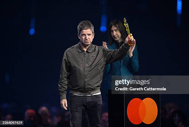 Noel Gallagher accepts the 'Songwriter of the Year' Award on stage during The BRIT Awards 2026 at Co-op Live on February 28, 2026 in Manchester,...