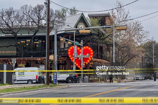 Members of the FBI perform and local law enforcement investigate outside of Buford's bar in downtown on March 01, 2026 in Austin, Texas. Three people...