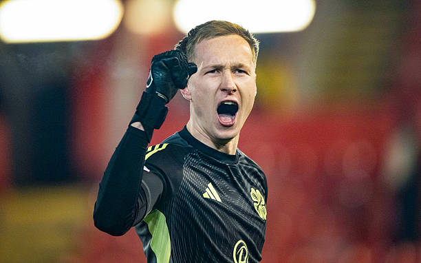 Celtic's Viljami Sinisalo celebrates at full time during a William Hill Premiership match between Aberdeen and Celtic at Pittodrie Stadium, on March...