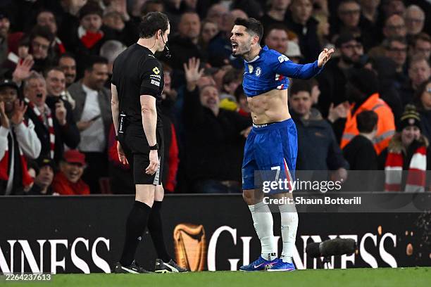 Pedro Neto of Chelsea reacts towards Referee Darren England after showing him a red card during the Premier League match between Arsenal and Chelsea...