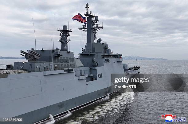 This picture taken on March 3, 2026 and released by North Korea's official Korean Central News Agency on March 5, 2026 shows the destroyer Choe Hyon...