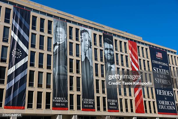 Banner with Charlie Kirk's image is seen on the outside of the Department of Education on March 01, 2026 in Washington, DC. The banner was a part of...